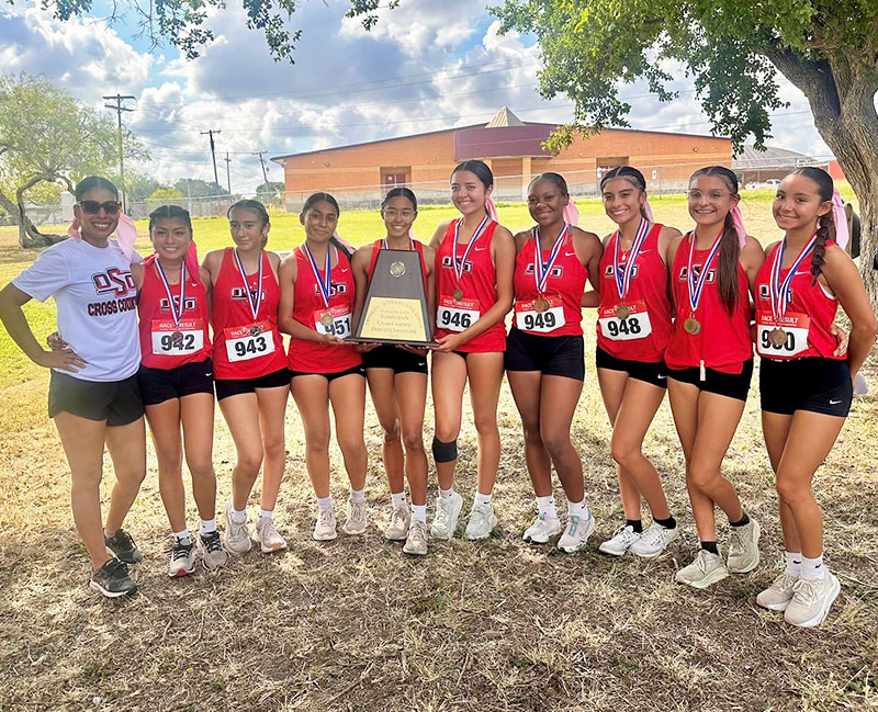 high-school_05 Happy elementary school girl looking up from her desk
