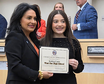 West Oso High School student receiving an award