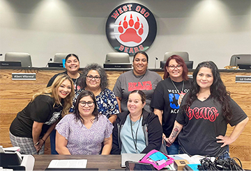 Group of happy adults in the board room