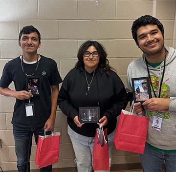 students with gift bags