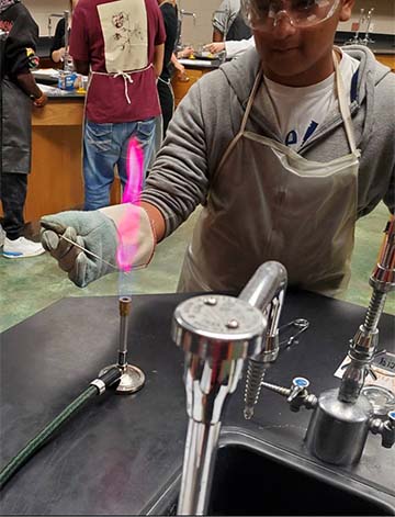 Student working with fire