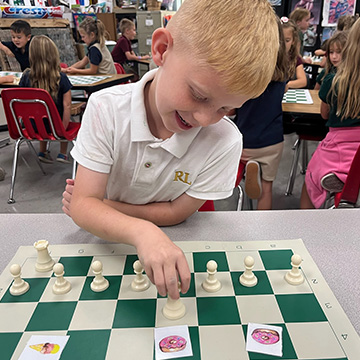 A student playing Chess