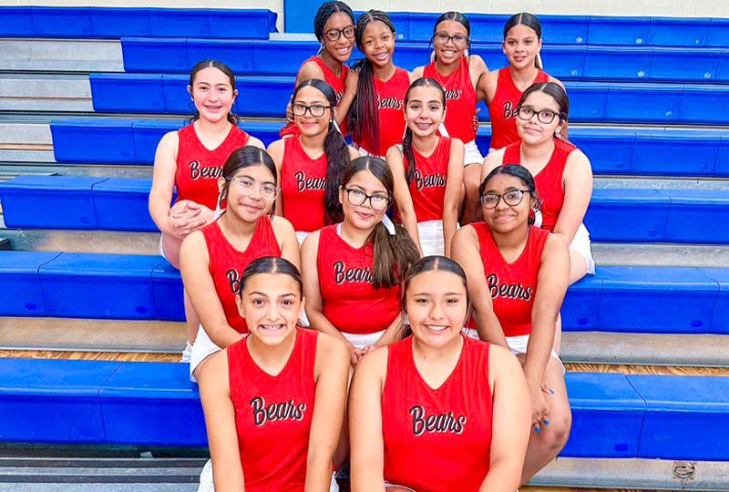 Cheerleaders on bleachers