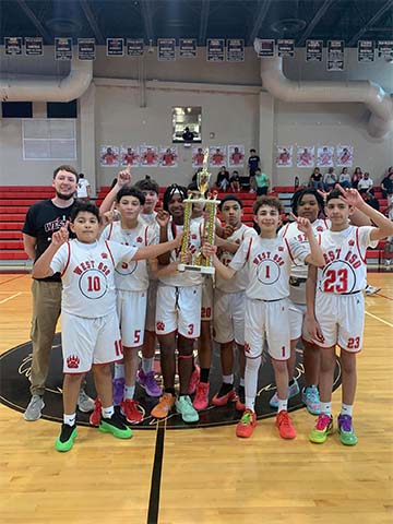 Basketball team with trophy