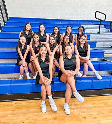 Cheerleaders on bleachers