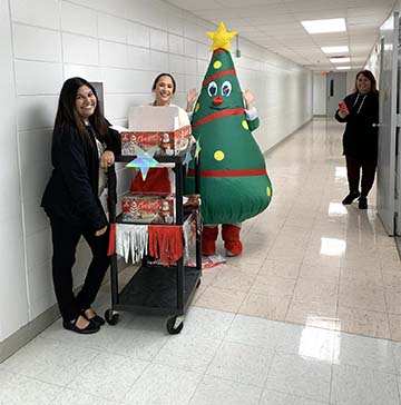 Teachers with blow up tree