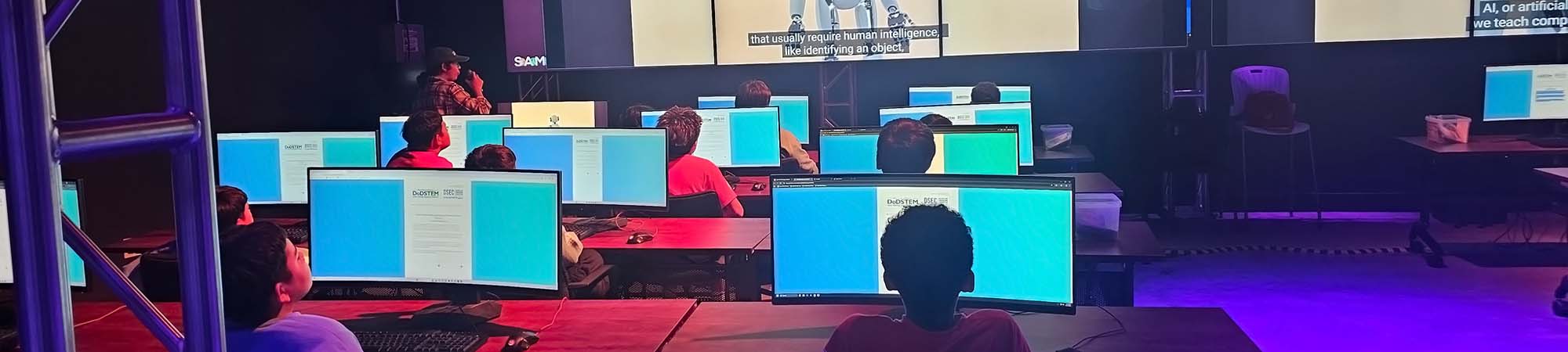 Students programing together