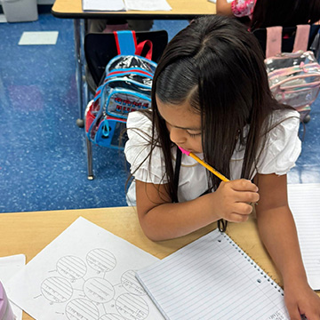 A students doing her classwork