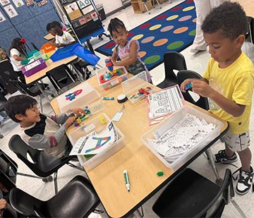 Students doing a craft assignment in class