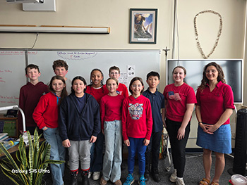 Group photo of students with a teacher
