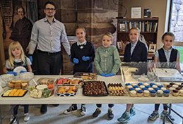 FMCA adult and students ready to serve goodies