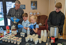 FMCA students serving punch