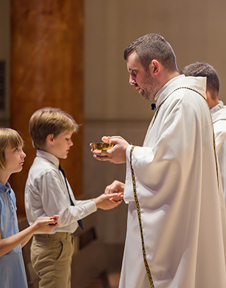 Students receiving communion