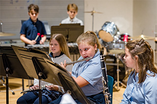 Students playing musical instruments