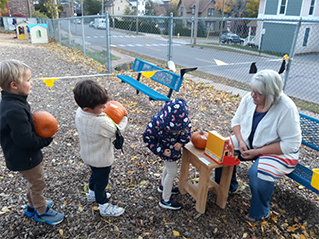 children with pumpkins