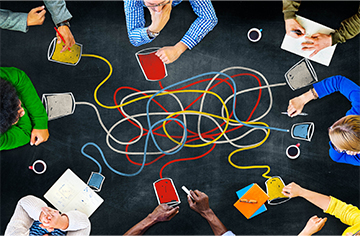 Staff members working together at a conference table