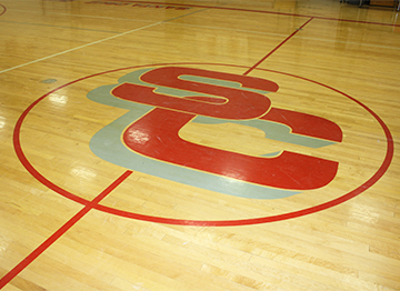Santa Cruz Valley Union HS logo on gym floor