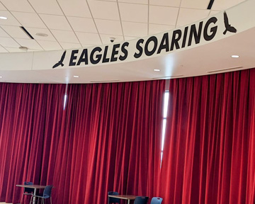 Eagles Soaring mural in school auditorium