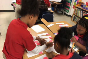 Students working on an assignment together in the classroom