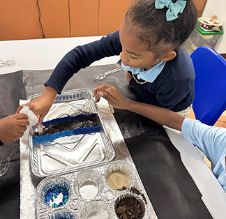 Group of engaged students working on a science project