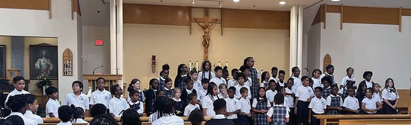 Students attending Mass choir