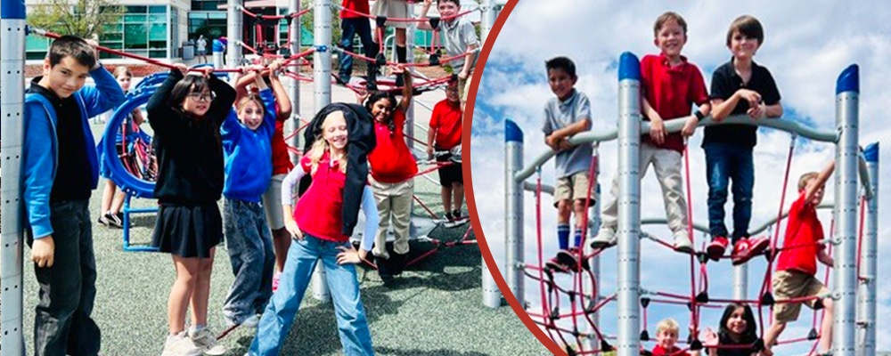 Happy elementary students playing on the playground