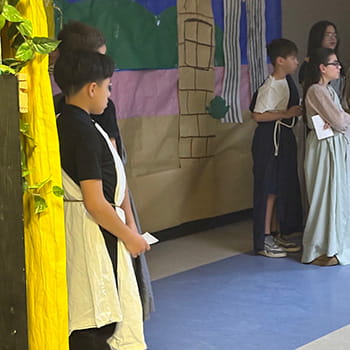 students performing a play