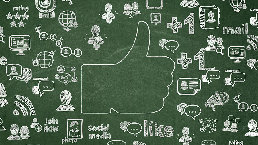 Social media icons around a thumbs up