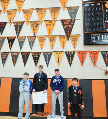 Student athletes being recognized in the gym