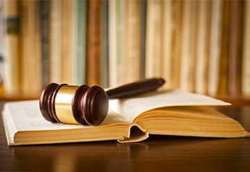 Open law Book with a gavel
