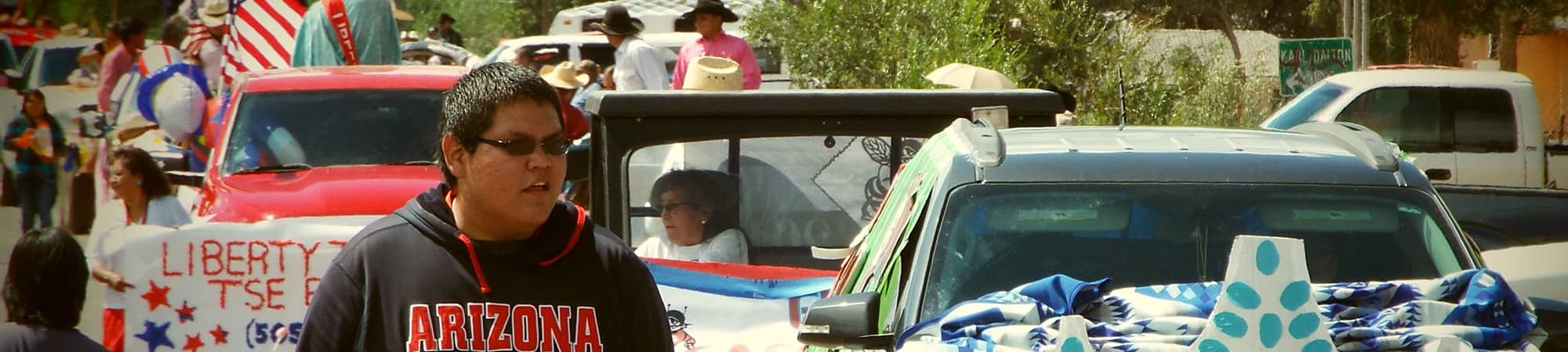 Students walking and riding in a school parade