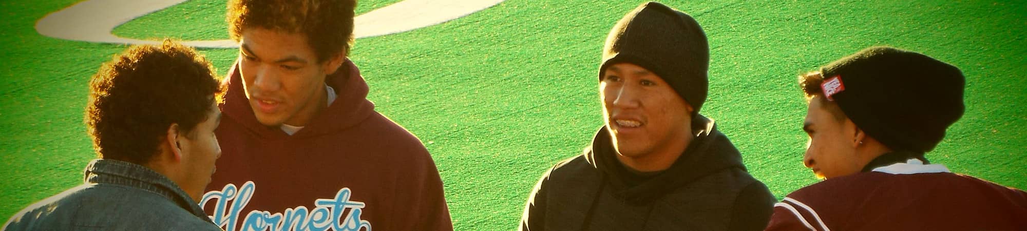 Four students on the football field