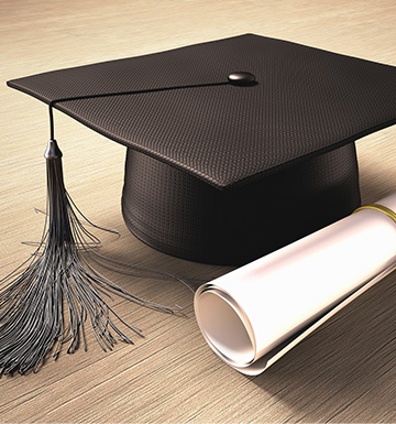 A graduation cap and diploma
