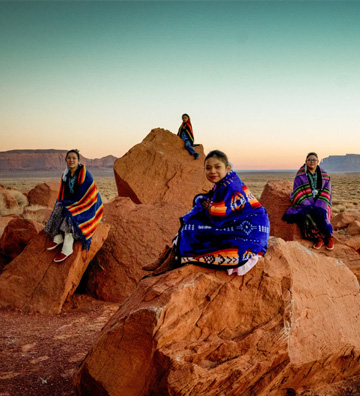 Navajo students outside on beautiful rock formations
