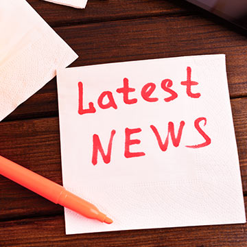 Napkin with the words Latest News on it