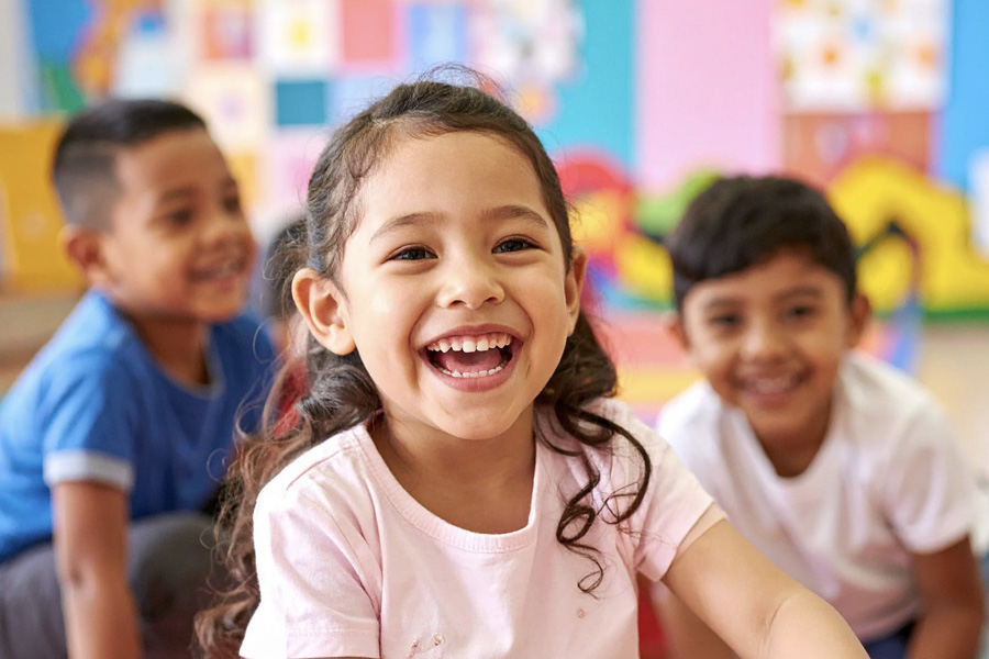 Happy Navajo kindergarten students in the classroom