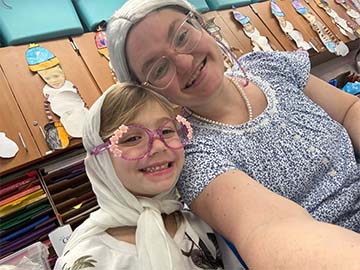 teacher and student dressed like a old ladies