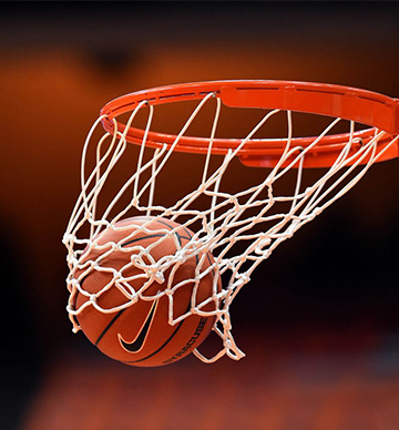 A basketball going through the net