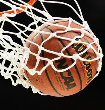 A basketball inside a basketball net