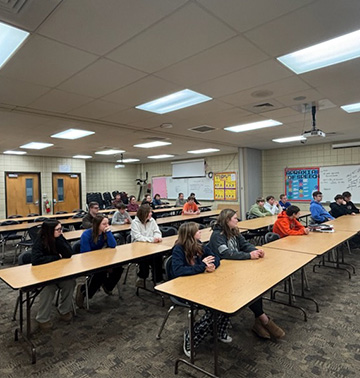 Students sitting at tables