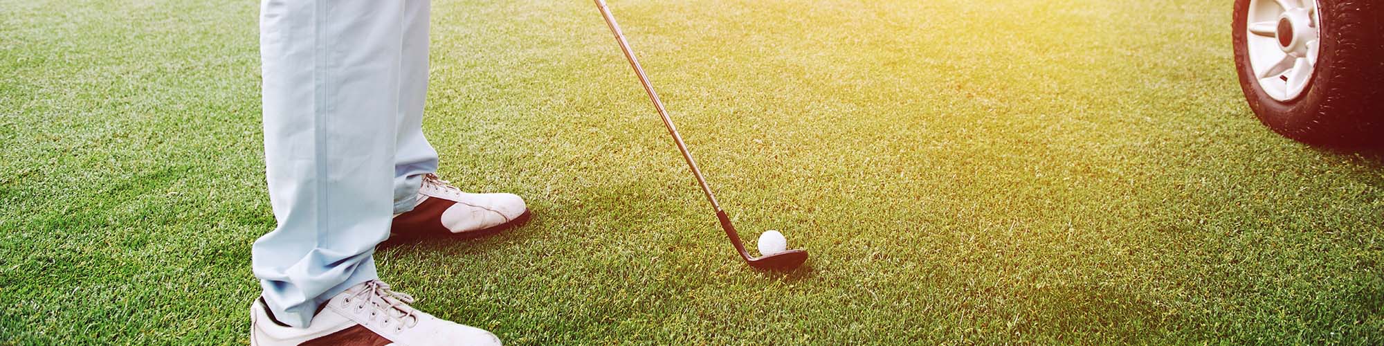 Golfer preparing to hit the ball