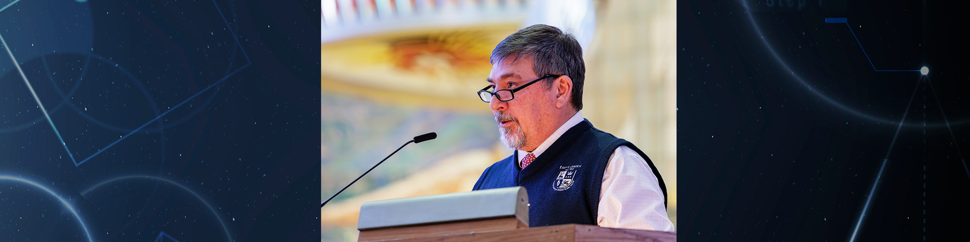 Sean Brennan, Chief Administrator, giving a speech at a podium