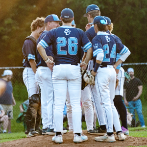 baseball team on the mound