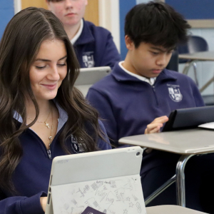 students on tablets