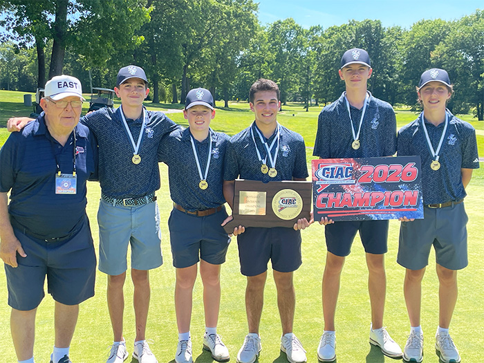 Boys golf team holding up CIAC Boys Division III Championship 2026 award