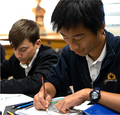 Two students working on school work