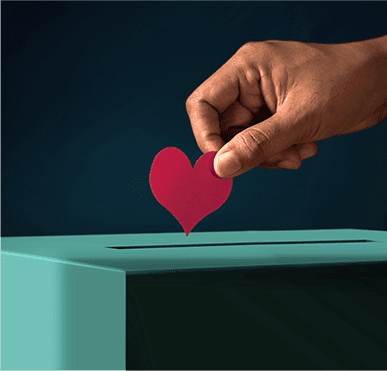 Heart being put in a donation box