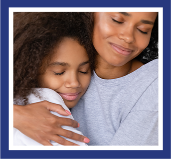 mother and daughter hugging