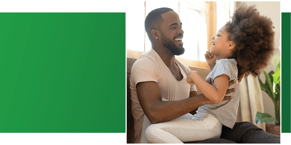 father and daughter playfully playing