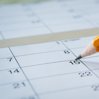 pencil writing on calendar